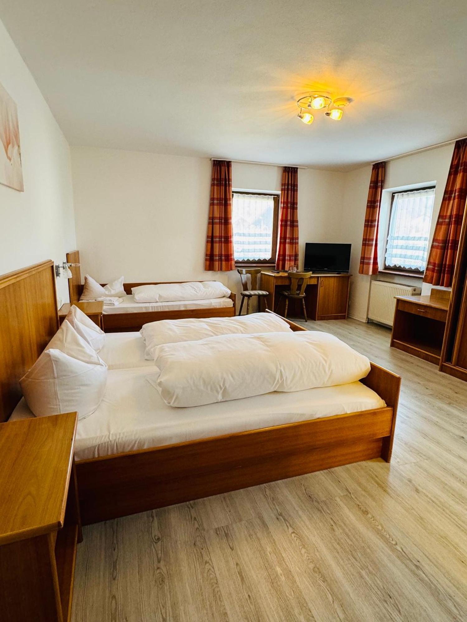 Dreibettzimmer